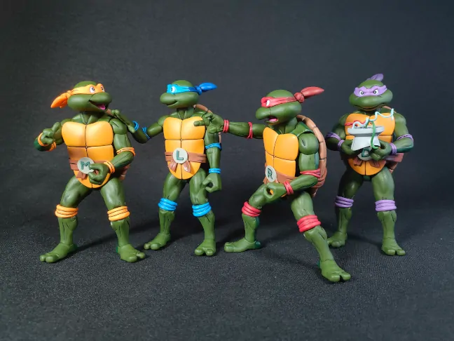 Imagen de las 4 figuras de las Tortugas Ninja Pizza Club de NECA