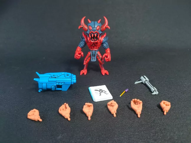 Imagen de los accesorios que trae la figura de Jack Kirby de NECA