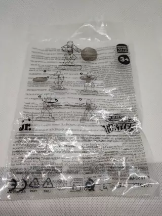 Imagen del plástico en el que vienen las figuras de Las Tortugas Ninja de Burger King que contiene las instrucciones